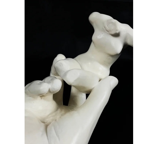 Sculpture of Rodin's Hand holding a female...