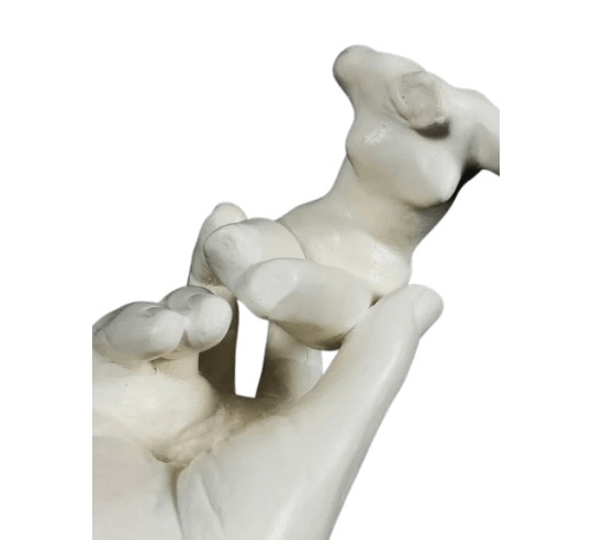 Sculpture of Rodin's Hand holding a female...