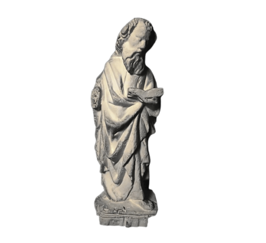 Estatua de apóstol leyendo la Biblia en la colegiata de San Martín de Brive Francia