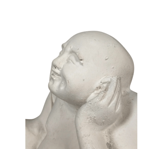 Estatuilla de Buda riendo sentado, símbolo de...