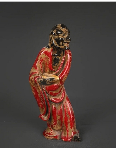 Statuette of a beggar with his begging bowl, Ming dynasty style, Chinese art.