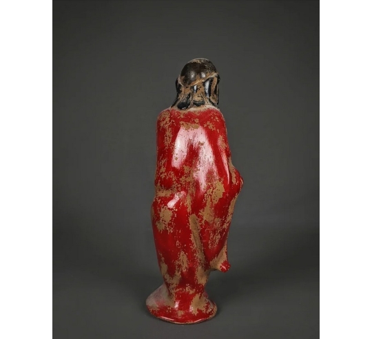 Statuette of a beggar with his begging bowl,...