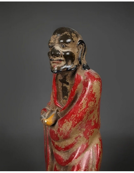 Statuette of a beggar with his begging bowl, Ming dynasty style, Chinese art.