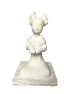 Statuette of a seated female musician playing with two...