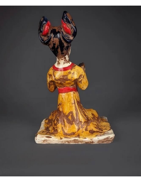 Statuette of a seated female musician playing cymbals, Tang dynasty style Chinese art.