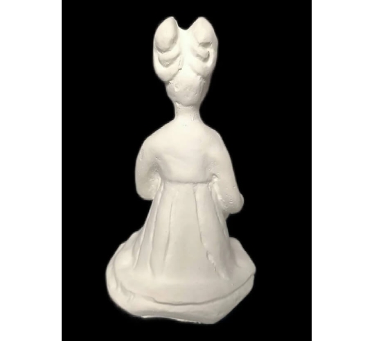 Statuette of a seated female musician playing a...