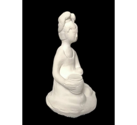 Statuette of a seated female musician playing a...