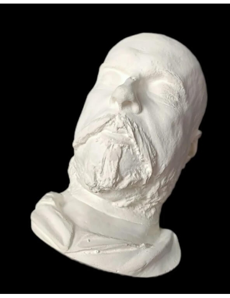 Masque mortuaire de Paul Verlaine sur son lit de mort.
