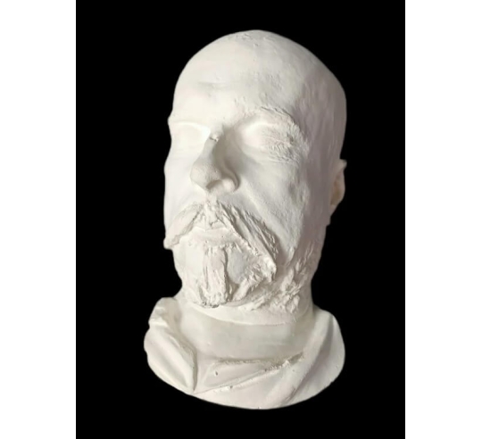 Máscara mortuoria de Paul Verlaine en su lecho...