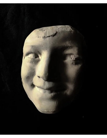 Masque de La Rieuse aux Roses d'après Jean-Baptiste Carpeaux.