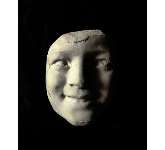 Mask of Laughing Girl with Roses after...