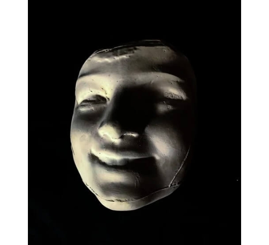 Mask of Laughing Girl with Roses after...