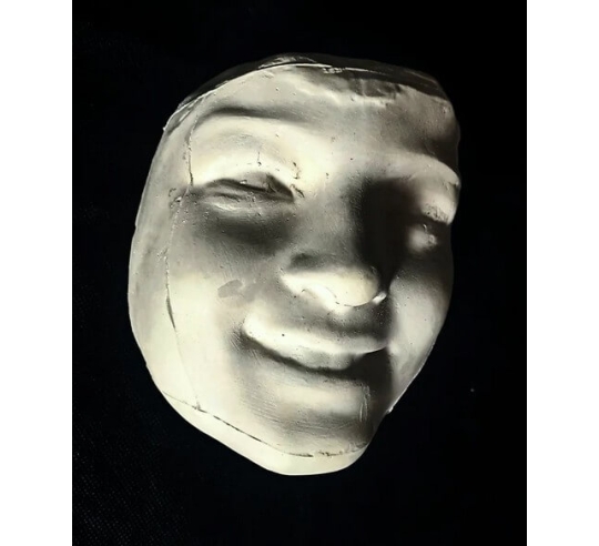Mask of Laughing Girl with Roses after...