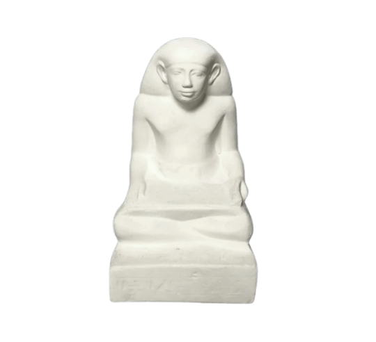 Statuette of an Egyptian scribe sitting cross legged