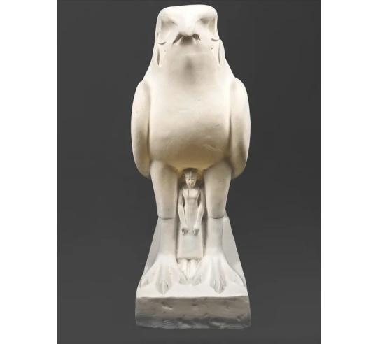 Statue of the god Horus protecting the Egyptian...