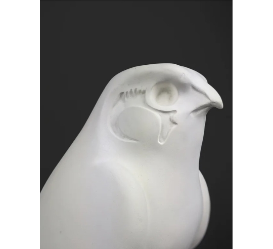 Statue of the god Horus protecting the Egyptian...