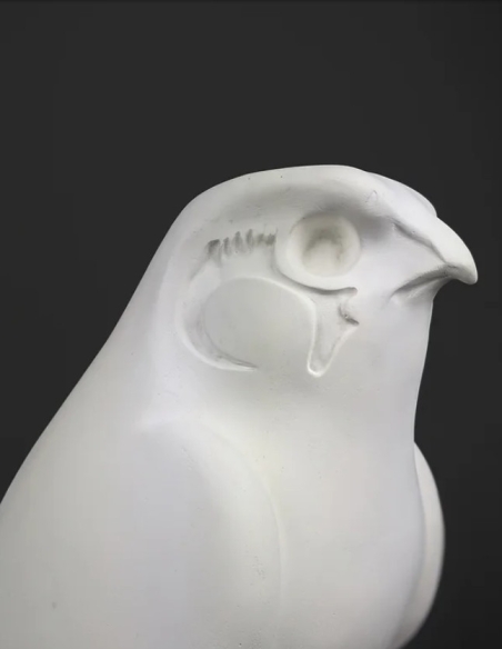 Statue of the god Horus protecting the Egyptian king Pharaoh Nectanebo II