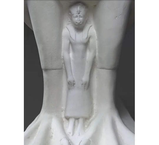 Statue of the god Horus protecting the Egyptian...