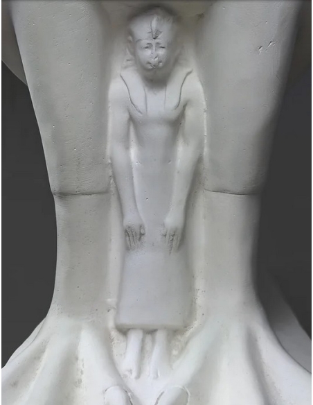 Statue of the god Horus protecting the Egyptian king Pharaoh Nectanebo II