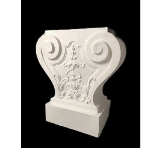 Leg of a garden bench decorated with floral...
