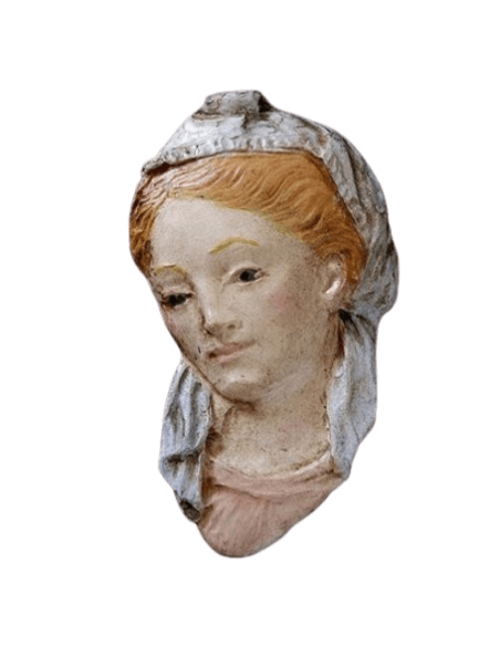 Medallón rostro de la Santísima Virgen, de estilo gótico.