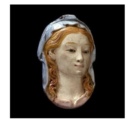 Medallion face of the Sistine Madonna after...