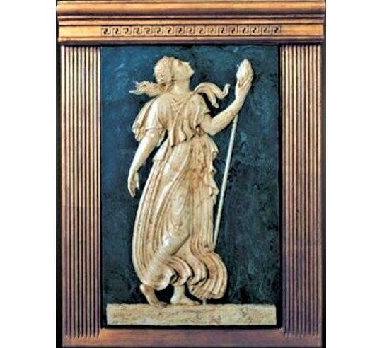 Low relief Maenad holding a  thyrse attribute of Dionysus.