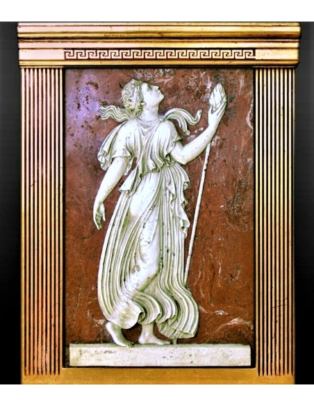 Low relief Maenad holding a Thyrsus, attribute of Dionysus.