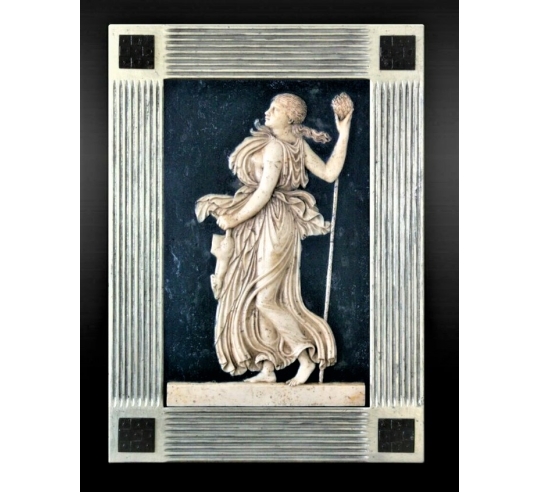 Low relief Maenad holding a Thyrse.