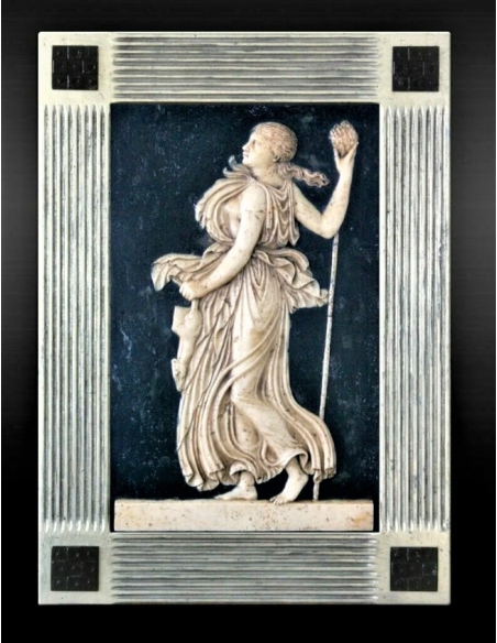 Low relief Maenad holding a Thyrse.