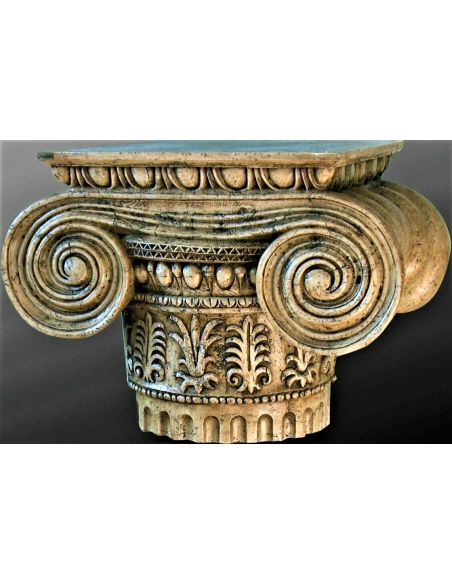 Coffee table base in the large Ionic capital style.