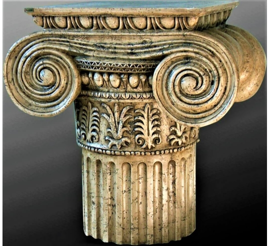 Pied de table style grand chapiteau ionique.