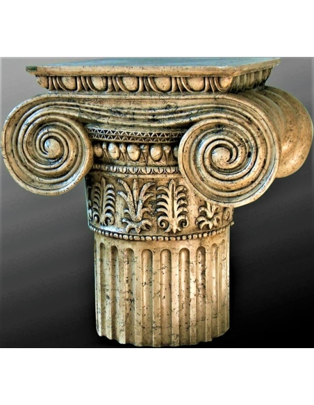 Pied de table style grand chapiteau ionique.