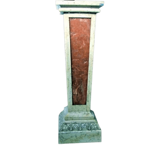 Square pedestal in Roman style, capital in form of an inverted pyramid.