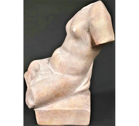 Torso of Venus seated without head.