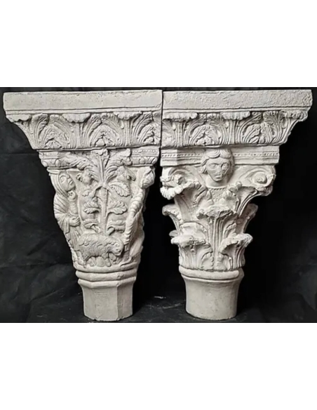 Twin capitals adorned with angels and saints - Gothic style