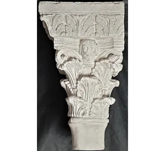 Twin capitals adorned with angels and saints -...