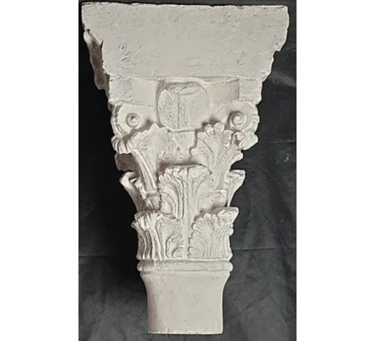 Twin capitals adorned with angels and saints -...