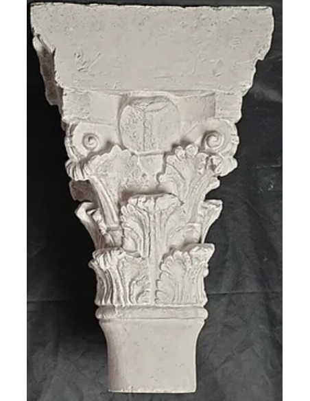 Twin capitals adorned with angels and saints - Gothic style