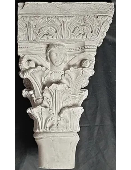 Twin capitals adorned with angels and saints - Gothic style