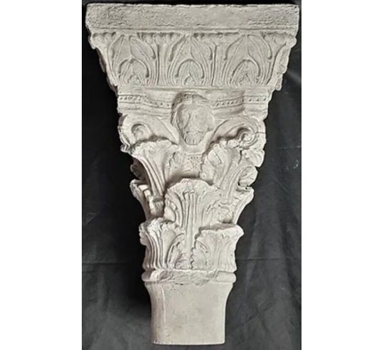 Twin capitals adorned with angels and saints -...