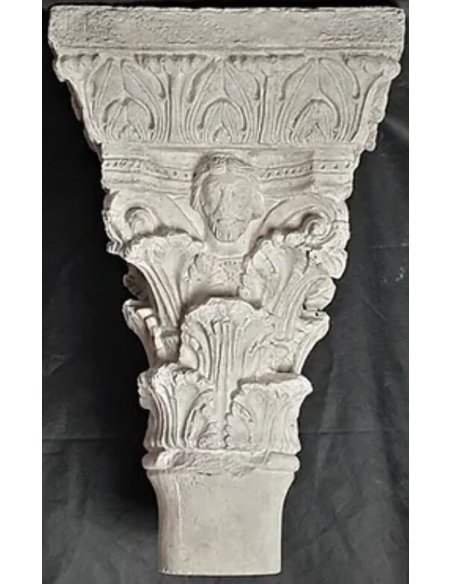 Twin capitals adorned with angels and saints - Gothic style