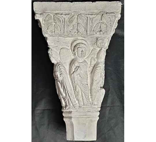 Twin capitals adorned with angels and saints -...