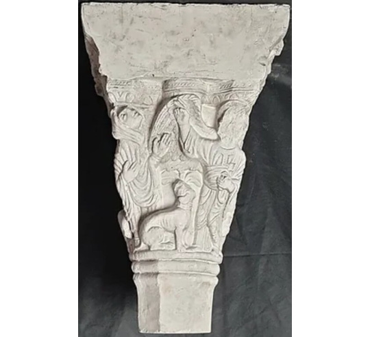 Twin capitals adorned with angels and saints -...