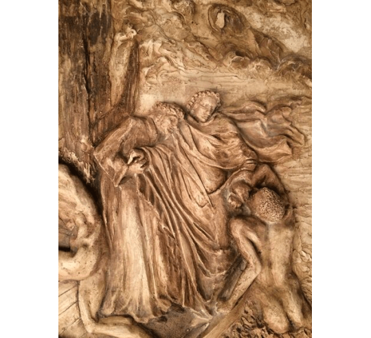 Bajorrelieve de Dante y Virgilio cruzando el...