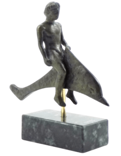 Bronze statue of a young man riding a dolphin,...